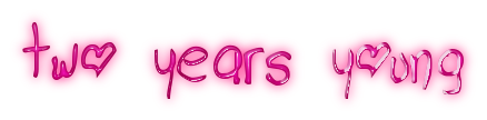 hot pink bubbly text with a balloon-like reflection and a faint pink gradient surrounding it. the text reads "two years young." notably, the o's in the text are shaped like hearts.